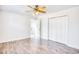 Spacious bedroom with wood-look floors, neutral walls, and natural light at 116 Great Lakes Rd., Pawleys Island, SC 29585