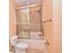 Clean bathroom with modern bathtub, shower, and white fixtures at 118 Birch N Coppice Dr. # 3, Surfside Beach, SC 29575