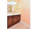 Bathroom featuring vanity and mirror with sleek design and ample lighting at 118 Birch N Coppice Dr. # 3, Surfside Beach, SC 29575