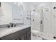 Modern bathroom featuring marble countertops, stylish fixtures, and a glass-enclosed shower at 1196 Fiddlehead Way, Myrtle Beach, SC 29579