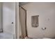 Neutral toned bathroom with modern fixtures, a toilet, and a shower/tub combo featuring a gray curtain and towel set at 124 Blue Jacket Dr., Galivants Ferry, SC 29544