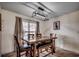 Cozy dining room with a rustic wood table and modern light fixture at 124 Blue Jacket Dr., Galivants Ferry, SC 29544