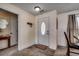 Inviting entryway featuring a white door, neutral walls, and wood-look flooring at 124 Blue Jacket Dr., Galivants Ferry, SC 29544