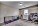 Versatile room featuring a large carpeted area, a window, and storage furniture at 124 Blue Jacket Dr., Galivants Ferry, SC 29544