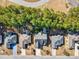 Aerial view of a residential neighborhood, showcasing well-maintained homes, landscaping, and proximity to wooded areas at 128 Belclare Way, Longs, SC 29568