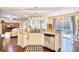 Open kitchen featuring granite countertops, stainless steel dishwasher, and view to the living room at 128 Belclare Way, Longs, SC 29568