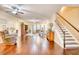 Spacious living room with hardwood floors, recessed lighting, and an open floor plan at 128 Belclare Way, Longs, SC 29568