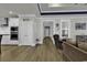 Bright hallway with hardwood floors leading to other rooms at 130 Black Water Dr., Murrells Inlet, SC 29576