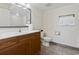 Bright bathroom with a single sink vanity and a tiled floor at 1321 S Ocean Blvd. # 1101, North Myrtle Beach, SC 29582