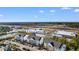 Aerial view of 136 Birch N Coppice Dr, located close to a highway at 136 Birch N Coppice Dr. # 11, Surfside Beach, SC 29575