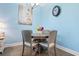 Charming dining area with round table and four chairs at 136 Birch N Coppice Dr. # 11, Surfside Beach, SC 29575