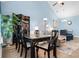 Open-concept dining area near the living room with bright, natural light at 136 Birch N Coppice Dr. # 11, Surfside Beach, SC 29575