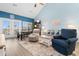 Light-filled living room featuring cathedral ceilings and direct access to the porch at 136 Birch N Coppice Dr. # 11, Surfside Beach, SC 29575