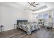 Spacious main bedroom with tray ceiling, ceiling fan and lots of natural light at 1377 Tessera Way, Myrtle Beach, SC 29579