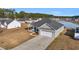 Single-story house with gray siding and a two-car garage at 142 Bancroft Dr., Conway, SC 29527