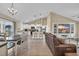 Open concept dining area with table and chairs overlooking kitchen at 142 Bancroft Dr., Conway, SC 29527