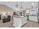 Open concept kitchen with island and granite countertops at 142 Bancroft Dr., Conway, SC 29527