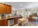 Open concept kitchen with stainless appliances flowing into the dining area at 1425 Tiger Grand Dr., Conway, SC 29526