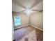 Well-lit bedroom with neutral wall colors and carpet flooring at 150 Honeydew Rd., Myrtle Beach, SC 29588