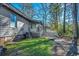 View of backyard with AC unit, deck, and small fence at 1500 Docksider Ct., Surfside Beach, SC 29575