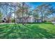 House with well-maintained lawn at 1500 Docksider Ct., Surfside Beach, SC 29575