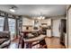 Eat-in kitchen with white cabinets, dark countertops, and black appliances at 1500 Docksider Ct., Surfside Beach, SC 29575