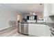 Modern kitchen with stainless steel appliances and granite countertops at 1525 Lanterns Rest Rd. # 102, Myrtle Beach, SC 29579