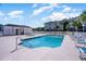 Sparkling community pool with lounge chairs and well-maintained surroundings at 1525 Lanterns Rest Rd. # 102, Myrtle Beach, SC 29579