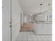 Bright living area featuring tile floors, fresh paint, and a seamless transition to the carpeted living area at 1538 Lanterns Rest Rd. # 103, Myrtle Beach, SC 29579