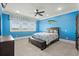 Blue bedroom with a mounted marlin and a comfortable bed at 1601 Waterway Dr., North Myrtle Beach, SC 29582