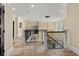 Elegant hallway with tiled floors and wrought iron railing at 1601 Waterway Dr., North Myrtle Beach, SC 29582