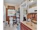 Cozy bathroom with a vintage sink and vanity and a floral wallpaper pattern at 1817 South Island Rd., Georgetown, SC 29440