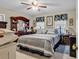 Comfortable bedroom featuring a ceiling fan, dresser, and serene decor at 1817 South Island Rd., Georgetown, SC 29440