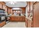 Spacious kitchen featuring wood cabinets, granite countertops, stainless steel appliances, and a convenient layout at 1817 South Island Rd., Georgetown, SC 29440