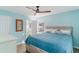 Bedroom with king-size bed and ceiling fan at 719 N Waccamaw Dr., Murrells Inlet, SC 29576