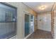 Home entryway with sliding glass doors and stone tile floor at 1901 Harris Short Cut Rd., Conway, SC 29526