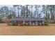 Brick ranch house with a large yard and mature trees at 1901 Harris Short Cut Rd., Conway, SC 29526