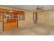 View of kitchen with wooden cabinets from the living room at 1901 Harris Short Cut Rd., Conway, SC 29526