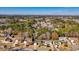 Aerial view of the community surrounded by lush trees and a serene lake offering a peaceful retreat at 2110 Green Heron Dr., Murrells Inlet, SC 29576