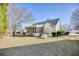 Spacious backyard featuring a covered porch and well-maintained landscaping offers tranquility at 2110 Green Heron Dr., Murrells Inlet, SC 29576