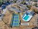 Aerial image of the community pool, tennis courts and parking area offer multiple lifestyle options at 2110 Green Heron Dr., Murrells Inlet, SC 29576