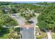 Aerial view of a meticulously landscaped roundabout, showcasing lush greenery and well-maintained surroundings at 212 Minnow Ln., Murrells Inlet, SC 29576