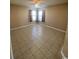 Large bedroom with neutral walls, tile flooring, and natural light at 2265 Huntington Dr. # A, Surfside Beach, SC 29575