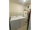 Functional laundry room with a washer, dryer, and water heater at 2265 Huntington Dr. # A, Surfside Beach, SC 29575