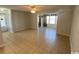 Open-concept living room with tile flooring and natural light at 2265 Huntington Dr. # A, Surfside Beach, SC 29575