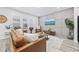 Bright living room featuring a leather sofa and modern decor at 2475 Blue Crane Circle # 104, Myrtle Beach, SC 29577