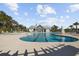 Relaxing community pool with plenty of lounge chairs and a cabana at 2475 Blue Crane Circle # 104, Myrtle Beach, SC 29577