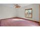 Bright bedroom featuring pink carpet, ceiling fan, and natural light through a window at 2531 Smiley Ln., Conway, SC 29526