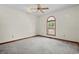 Bedroom with a ceiling fan, a window with outside view and neutral carpet at 2531 Smiley Ln., Conway, SC 29526