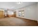 Inviting living room with carpet, white walls, and abundant natural light from a large window at 2531 Smiley Ln., Conway, SC 29526